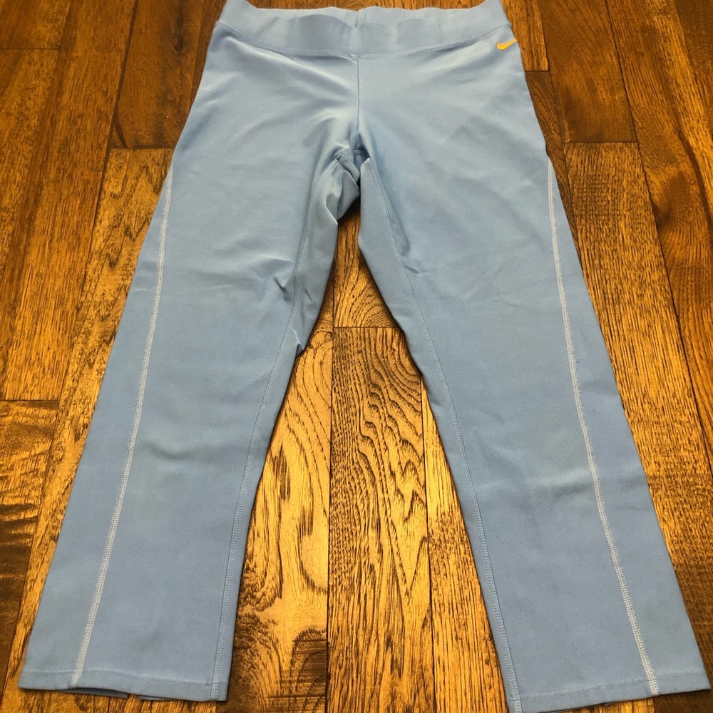 Blue Nike running crop leggings